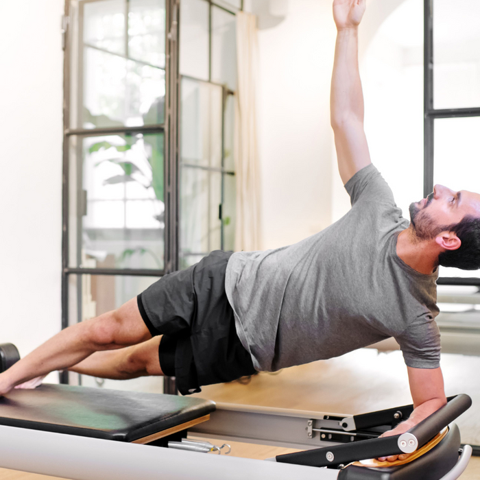 practical reasons you should own a pilates reformer machine featured image